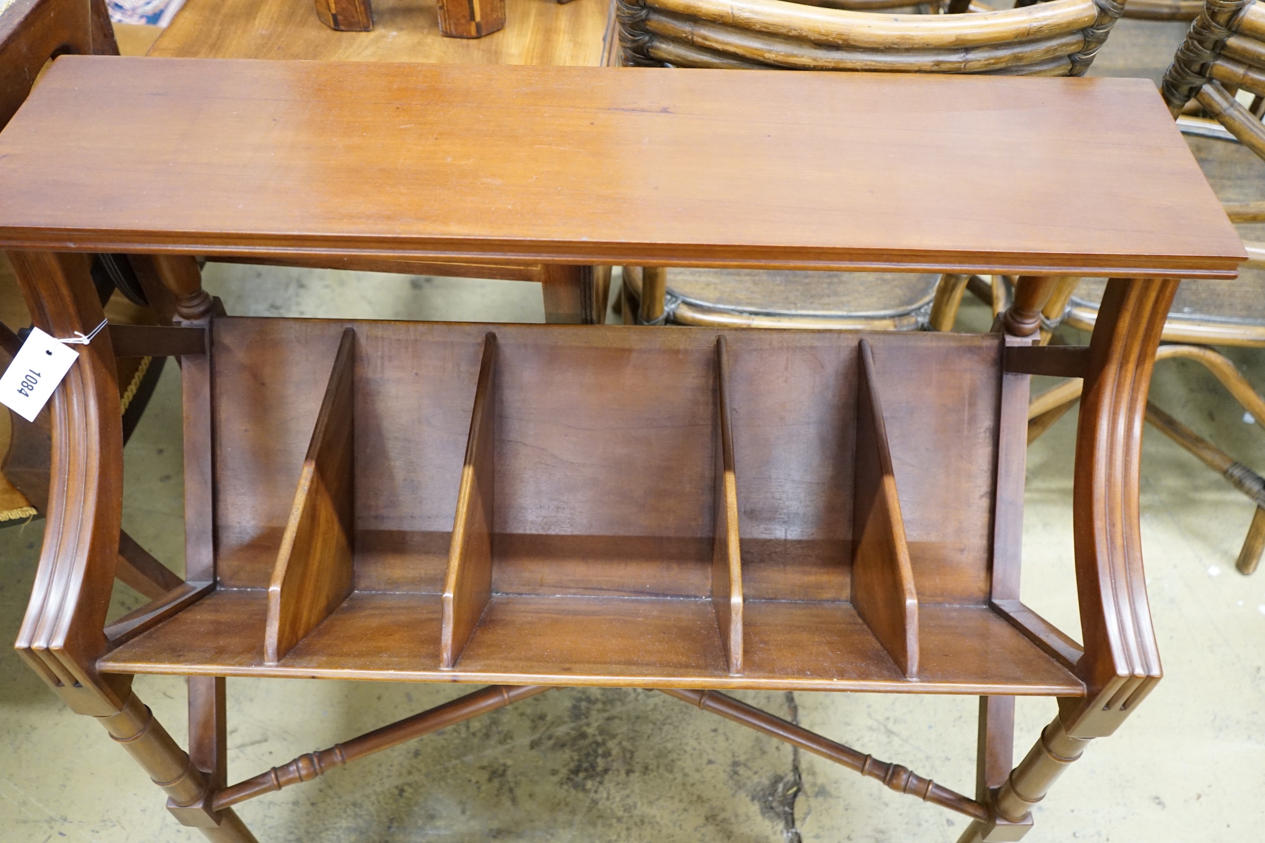 A reproduction mahogany five division book table, width 90cm, depth 40cm, height 84cm